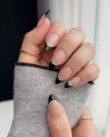 Classic Return - Ebony press-ons with polished black French styling and soft nude contrast