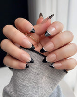 Classic Return - Ebony nails with nude base, black tips, and clean white accent lines