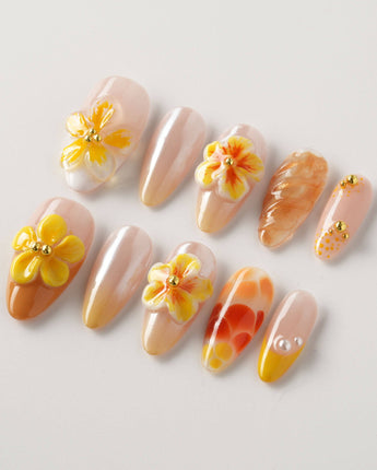 Caramel Bloom press-on nails in S medium almond with warm caramel flower accents