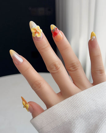 Caramel Bloom press-on nails in L medium almond with caramel tones and soft floral details