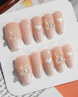 Cute Bear Hug press-on nails in medium coffin shape — cute nails