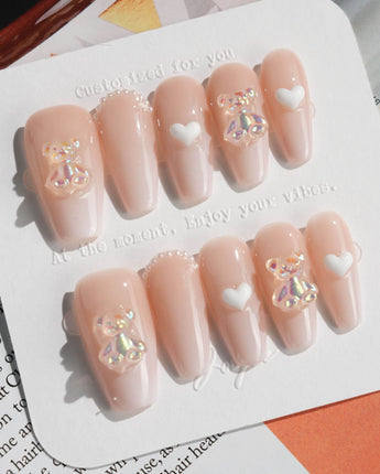 Cute Bear Hug press-on nails in medium coffin shape — cute nails