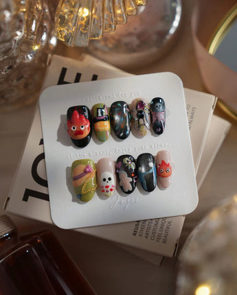 Cute Flame Elves nails in medium oval — cartoon mix design flame