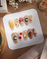 Cute Hedgehog press-on nails with cozy woodland details and glossy fall gel finish
