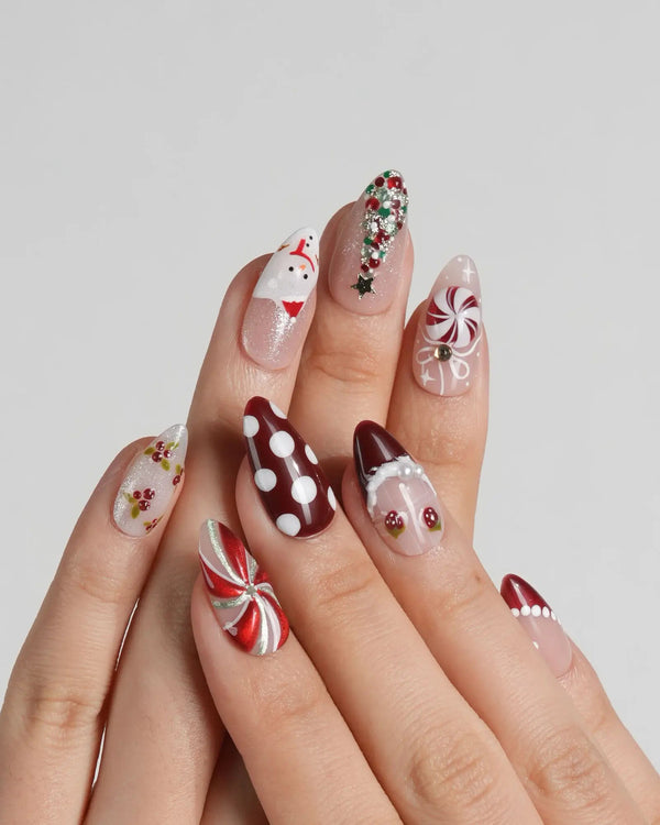 Cute red and white Christmas nails with holiday tree design