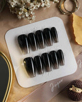 Cutting Edge press-on nails in medium coffin shape — Black ombre nails
