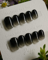 Cutting Edge press-on nails in extra short oval shape — Black ombre nails