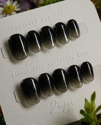 Cutting Edge press-on nails in extra short oval shape — Black ombre nails