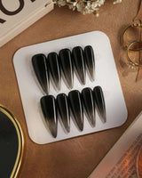 Cutting Edge press-on nails in long stiletto shape — Black ombre nails