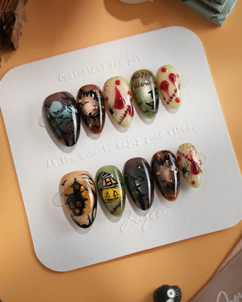 Spooky Night press-on nails in extra short almond shape — Vintage Halloween, Pumpkin Castle & Blood Splatter.
