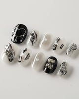 Dark Ice press-on nails in extra short oval shape — black gradient silver chrome 3D gothic nails