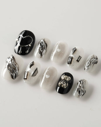Dark Ice press-on nails in extra short oval shape — black gradient silver chrome 3D gothic nails