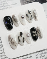 Dark Ice handmade press-on nails featuring black gradient silver chrome 3D gothic nails