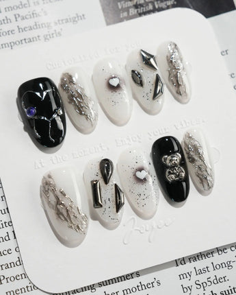 Dark Ice handmade press-on nails featuring black gradient silver chrome 3D gothic nails