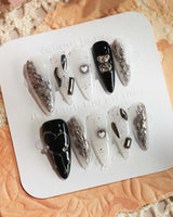 Dark Ice nail art close-up showing black gradient silver chrome 3D gothic nails details