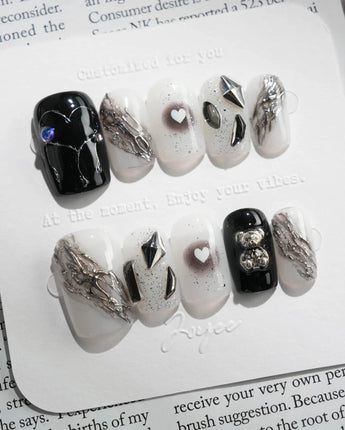 Dark Ice press-on nails in short square shape — black gradient silver chrome 3D gothic nails