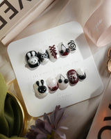 Dark Miffy nails in extra short squoval — black white red mix