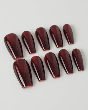 Deep Red Cat eye Nails press-on nails in medium coffin shape — red cat eye christmas holiday