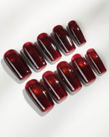Deep Red Cat eye Nails press-on nails in medium square shape — red cat eye christmas holiday
