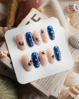 Denim Berry blueberry press-on nails in medium oval shape