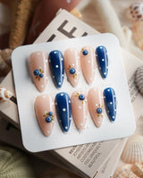 Denim Berry blueberry press-on nails in medium stiletto shape