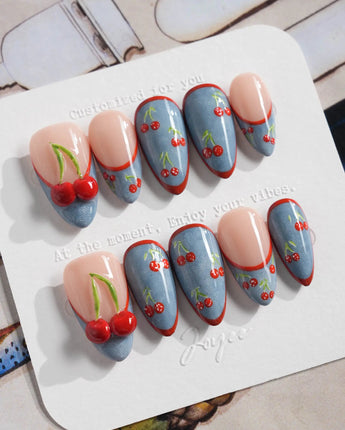 Denim Cherry glossy summer nails with denim blue French tips and bright red cherries