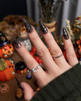 Devil Charm press-on nails in medium stiletto shape — Sheer Black Gothic, 3D Skull & Dark Aesthetic.