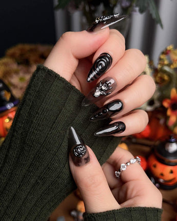 Devil Charm press-on nails in medium stiletto shape — Sheer Black Gothic, 3D Skull & Dark Aesthetic.