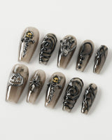 Devil Charm press-on nails in medium coffin shape — Sheer Black Gothic, 3D Skull & Dark Aesthetic.