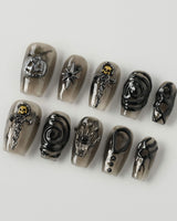 Devil Charm press-on nails in short coffin shape — Sheer Black Gothic, 3D Skull & Dark Aesthetic.