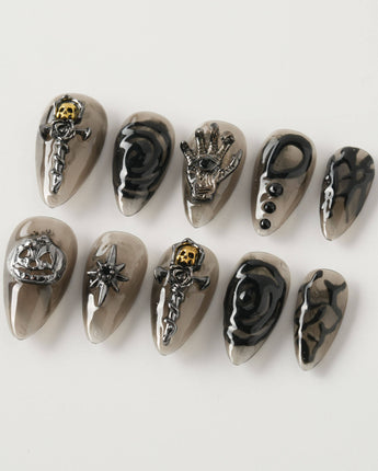 Devil Charm press-on nails in short stiletto shape — Sheer Black Gothic, 3D Skull & Dark Aesthetic.