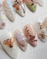 Dew Wing handmade press-on nails featuring Dreamy Night, Metallic Relief Dragonflies & Fluid Butterfly Wings.