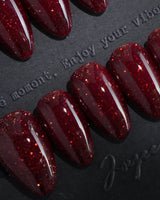 Diamond Gloss nail art close-up showing red Base, featuring a Full Overlay of Dense and Fine Silver Glitter. details