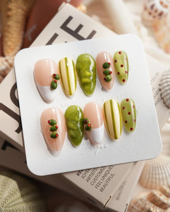 Dirty Martini medium almond nails with liquid green chrome and sculpted olives