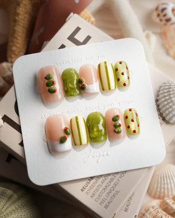 Dirty Martini short square nails with olive green shimmer and tiny red pimento accents