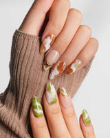 Double Latte latte art press-on nails with creamy matcha, coffee, and gold foil accents