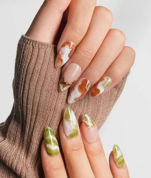 Double Latte latte art press-on nails with creamy matcha, coffee, and gold foil accents