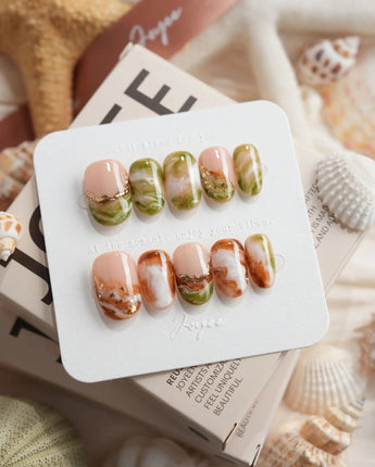 Double Latte coffee and matcha marble press-on nails in short oval shape