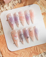 Dreamglow short almond nails with fairytale pearl details and glossy pink finish