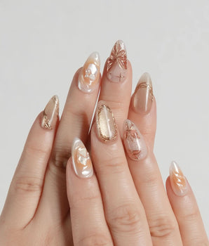 Dreamland Glow press-on nails with gold 3D sculpted butterflies and bridal fall shimmer
