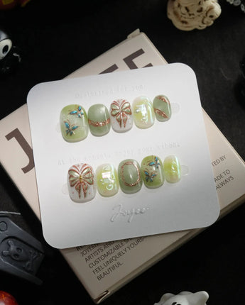 Dreamland 🦋 handmade press-on nails in extra short squoval shape by Joyee Nails