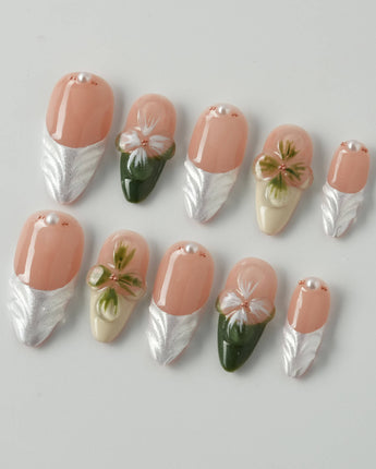 Duchess Olive in medium almond shape with olive French tips and raised floral art