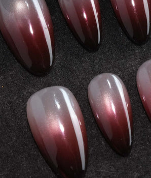 Dusk press on nails fading from champagne pearl through rose to a deep burgundy tip with shimmer through the whole nail - image 1