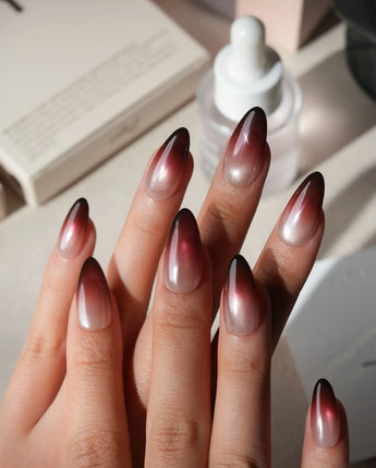 Dusk press on nails fading from champagne pearl through rose to a deep burgundy tip with shimmer through the whole nail - image 2