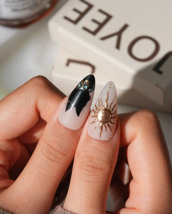 Egyptian Gold M press-on nails in medium stiletto with ancient Egyptian gold details
