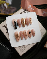 Egyptian Gold medium almond press-on nails