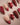 Elegant red 3D lily press-on nails with gold accents