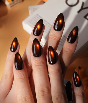 Ember spotlight cat eye press on nails, dark coffee brown with a glowing amber magnetic spot - image 1