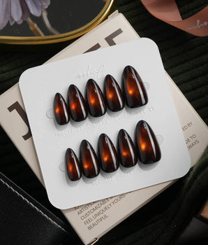 Ember spotlight cat eye press on nails, dark coffee brown with a glowing amber magnetic spot - image 2