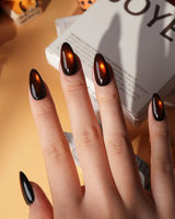 Ember spotlight cat eye press on nails, dark coffee brown with a glowing amber magnetic spot - image 3